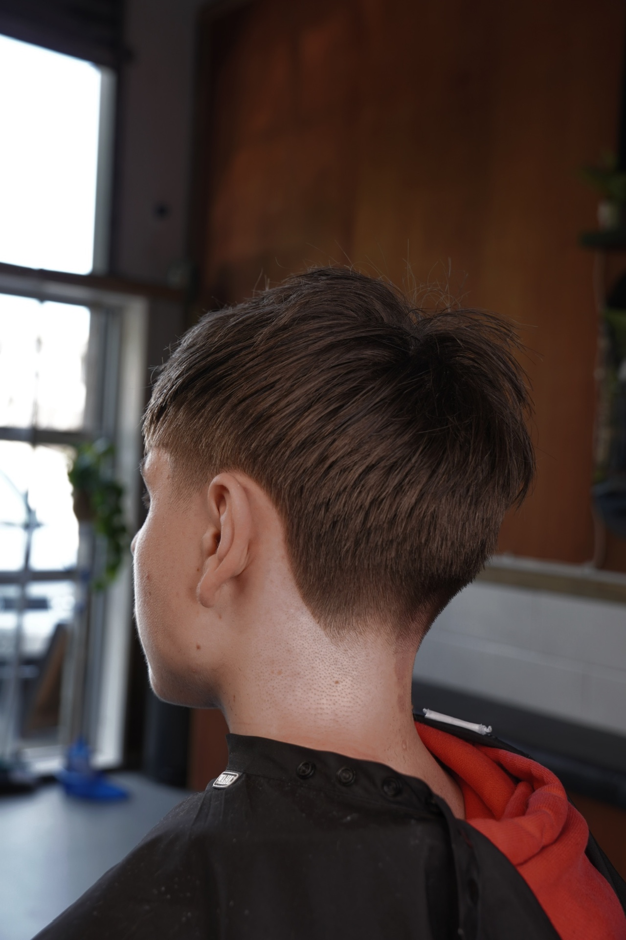 Clean taper fade from behind