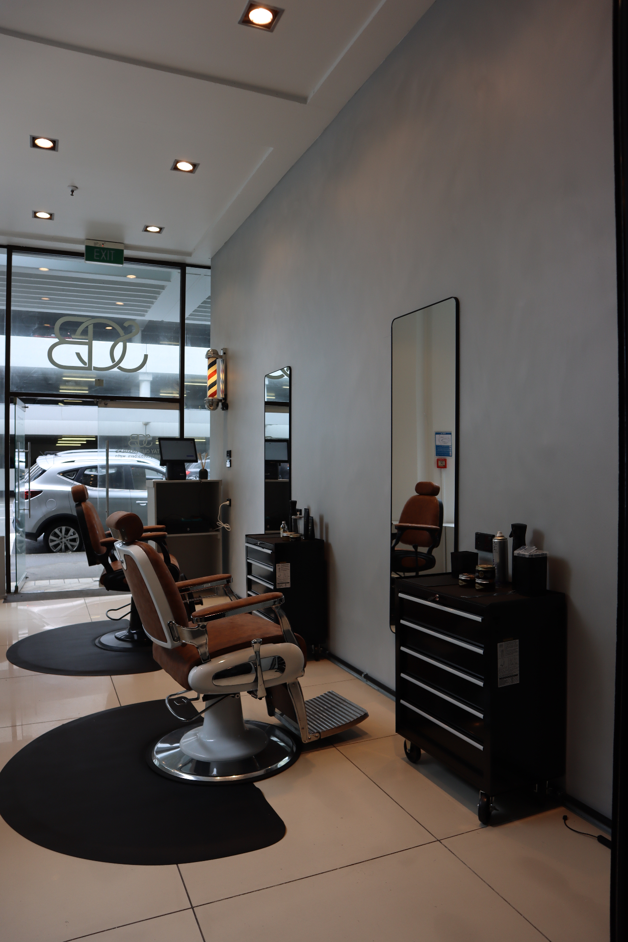 Shop entrance with chair and mirror
